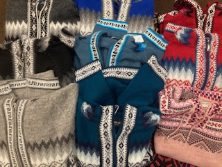 A selection of alpaca wool sweaters sold by Green Hummingbird Fair Trade